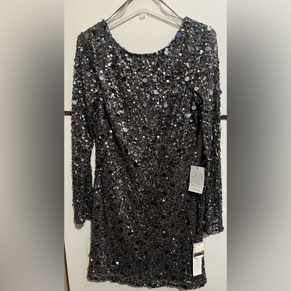 NWT party dress Size 14 Putter sequins dress.